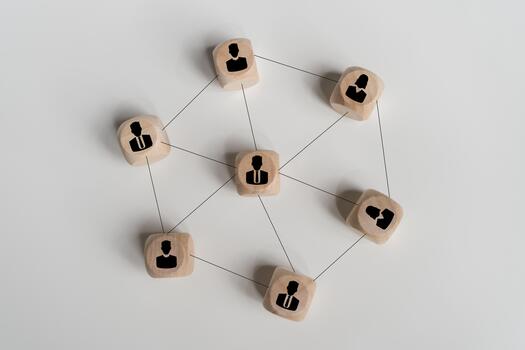 Business network connection concept with wooden blocks linked together symbolizing teamwork and communication photo