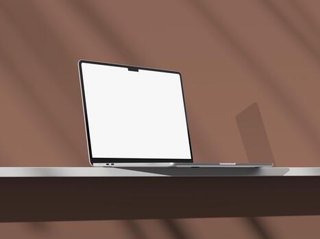 Modern laptop mockup with an empty display on a soft-colored background. photo