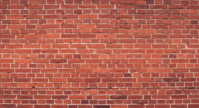 Warm, weathered red brick wall texture offering a classic, rustic backdrop for diverse design projects photo