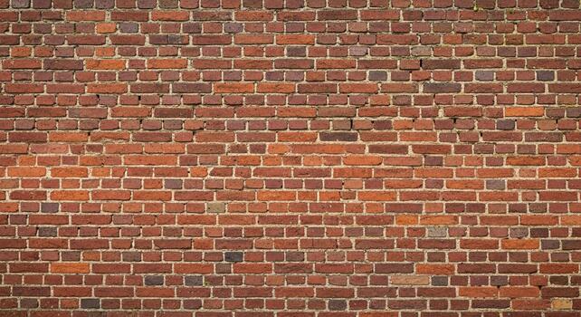 Durable weathered red brick wall surface provides textured background for construction and design projects photo