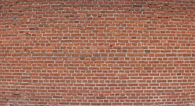 Aged weathered red brick wall texture providing rustic charm and authentic building facade detail for design projects photo