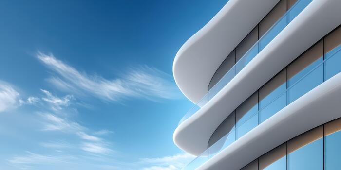 Modern architecture building with curved windows and sky background photo