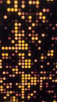 Vertical glowing halftone yellow and orange circle animation. Abstract tech pattern with warm luminous dots and smooth motion in seamless loop. video
