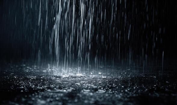 A rainy day with rain falling from the sky photo