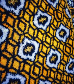 Detailed Geometric Pattern Yellow, White, and Black Abstract Surface photo