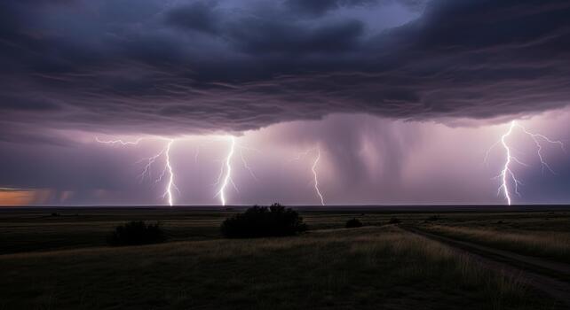 A dramatic landscape featuring multiple lightning strikes under a stormy, dark sky at twilight photo