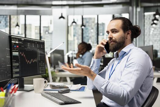 Financial advisor in office using smartphone, speaking in telephone call with clients to develop investing strategies. Consultant using mobile phone to chat with customers, providing services photo