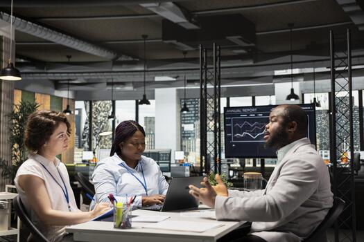 Diverse recruiters evaluating an applicant CV resume during interview session focused on selecting candidates with relevant qualifications and strong career ambition. Head hunting. photo