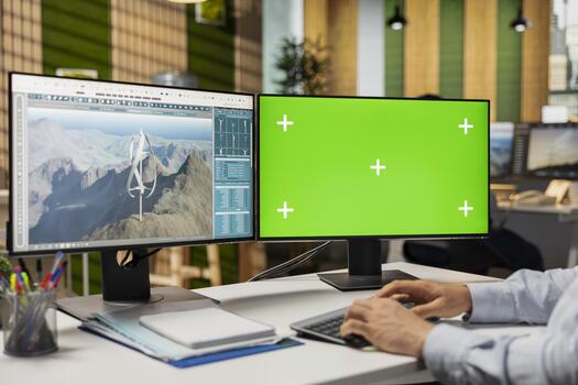 Technician using green screen PC to evaluate next generation wind turbine boosting green energy output. Product designer develops cutting edge vertical axis wind turbine using mockup computer photo