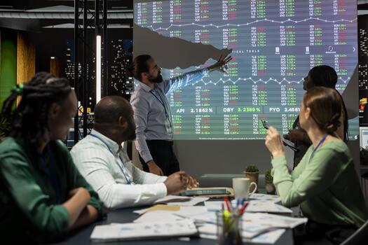 Enterprise manager works on creating business strategies and goals, studying market dynamics and customer feedback shown on projection board. Team attending a development meeting. photo