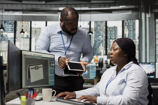 Angry RD manager berating employee for failing on clean energy solar device project. Disappointed green tech company supervisor upset with worker failing to design working solar gadget prototype photo