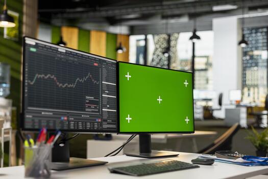 Close up of green screen computer monitor displaying candlestick graphs with stock market shares volatility. Trading interface on chroma key PC showing financial data analysis of stock exchange assets photo