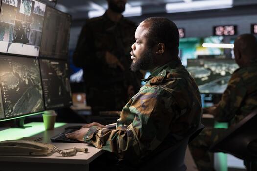Counterterrorism division officer using target acquisition tech to detect enemy location. Defense security agent in base of operations using satellite equipment to track threats photo