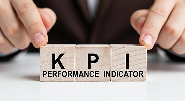 Hands arranging wooden blocks with KPI Performance Indicator text on a white table representing business strategy success measurement and goal achievement in a corporate environment photo