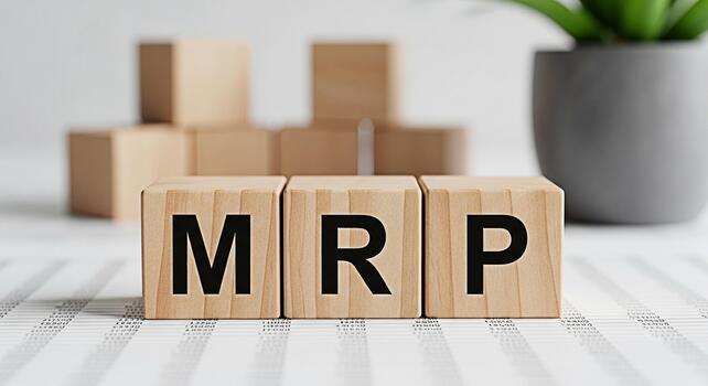 Wooden blocks displaying MRP on a financial document in a bright office symbolizing manufacturing resource planning and efficient business management for supply chain optimization and cost control photo