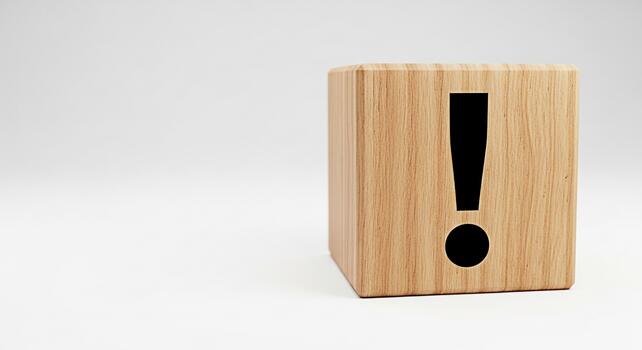 Wooden cube displaying a black exclamation mark on a clean white background symbolizing urgency importance and a call to action creating a sense of alert and attention in a minimalist setting photo