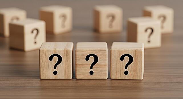 Wooden blocks displaying question marks on a wooden surface representing uncertainty and curiosity inviting viewers to explore the unknown and seek answers in a world full of possibilities and challen photo