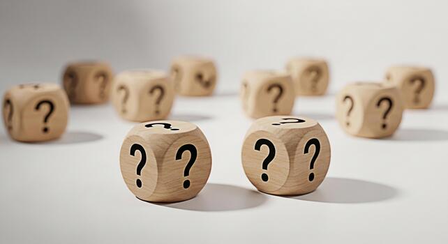 Wooden dice displaying question marks on a white surface representing uncertainty and the need for answers in a clean minimalist setting evoking a sense of curiosity and problemsolving photo
