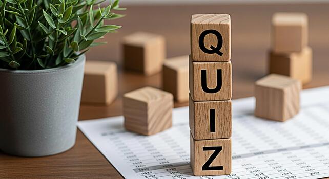 Wooden blocks spelling QUIZ standing on a financial report in a bright office representing knowledge testing and assessment with a playful and engaging educational concept for learning and development photo