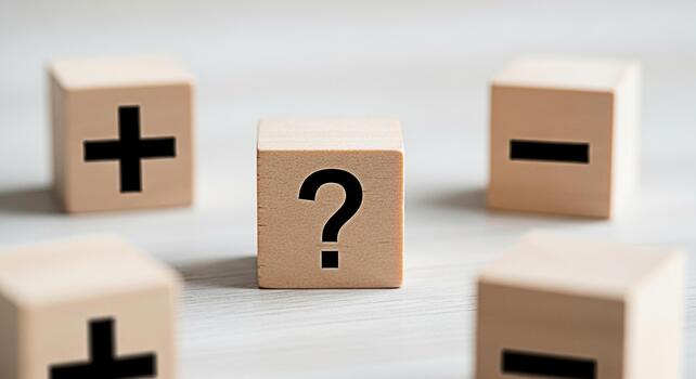 Wooden blocks displaying plus minus and question mark symbols on a white wooden surface representing choices decisions and problemsolving in a bright and clean environment creating a thoughtful mood photo
