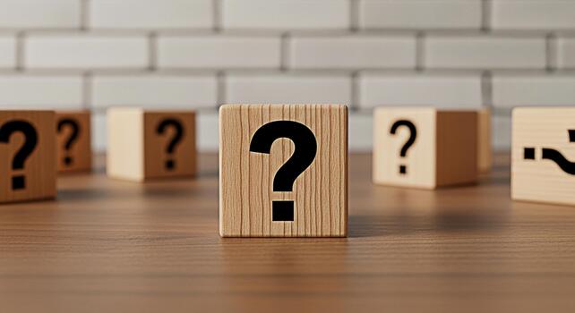 Wooden blocks displaying question marks on a wooden surface against a brick wall symbolizing uncertainty inquiry and the search for answers in a visually engaging and thoughtprovoking composition photo