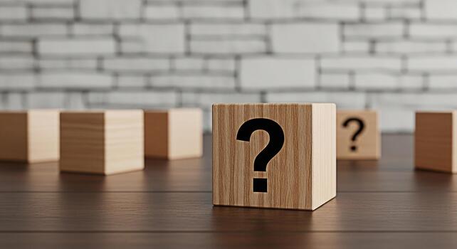 Wooden blocks displaying question marks on a dark wooden surface against a blurred brick wall representing uncertainty inquiry and the search for answers in a minimalist and thoughtprovoking compositi photo