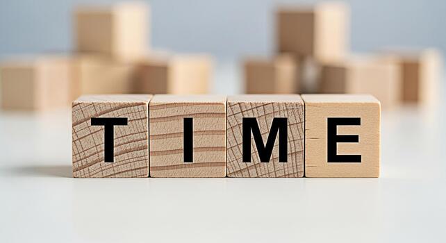 Wooden blocks spelling TIME on a white surface representing the concept of time management deadlines and the importance of punctuality in a modern business environment conveying a sense of urgency photo