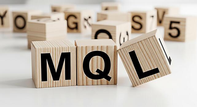 Wooden blocks spelling MQL on a white surface representing marketing qualification in a bright and clean setting conveying a sense of learning and business strategy photo