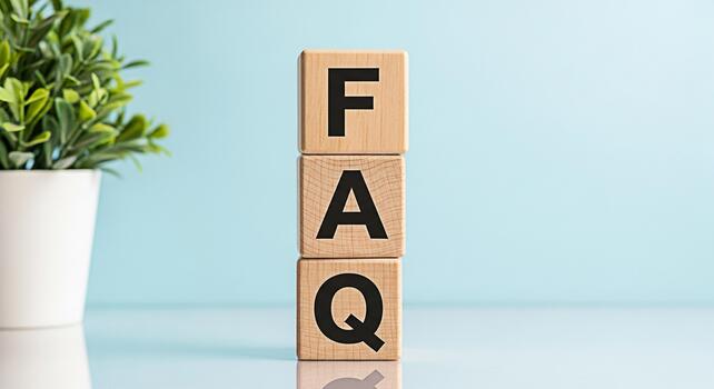 Wooden blocks displaying FAQ in a bright studio setting representing frequently asked questions and providing answers promoting clarity and customer support for online businesses and information resou photo