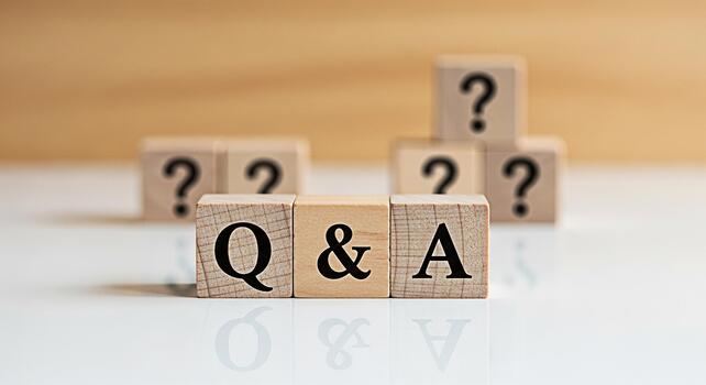 Wooden blocks displaying Q A and question marks on a white surface symbolizing knowledge learning and problemsolving in a bright educational environment fostering curiosity and understanding photo