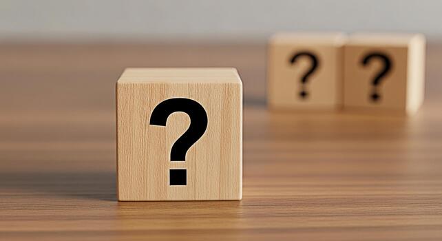 Wooden blocks displaying question marks on a wooden surface symbolizing uncertainty and the need for answers in a business or educational setting fostering curiosity and problemsolving photo