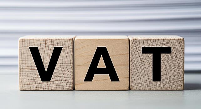 de madera bloques mostrando IVA en un neutral superficie representando valor adicional impuesto y financiero conformidad en un negocio ajuste transporte un sentido de orden y precisión en financiero asuntos foto