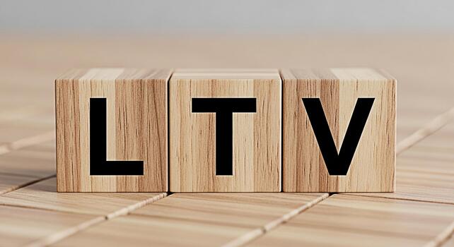 Wooden blocks displaying LTV on a wooden surface representing the concept of Lifetime Value in a business setting emphasizing financial planning and customer relationship management for longterm succe photo