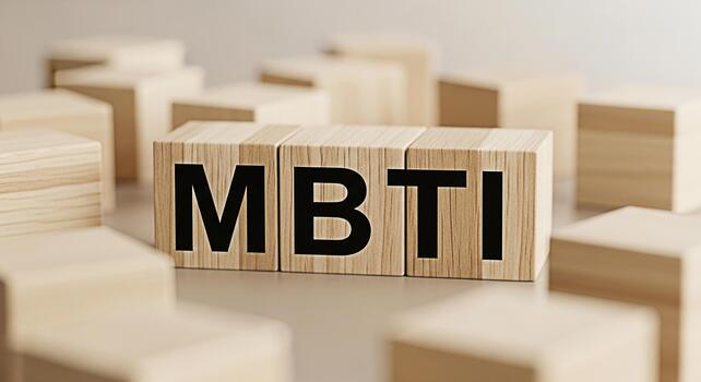 Wooden blocks displaying MBTI in a neutral setting representing personality assessment and psychological type fostering selfawareness and understanding in a learning environment photo