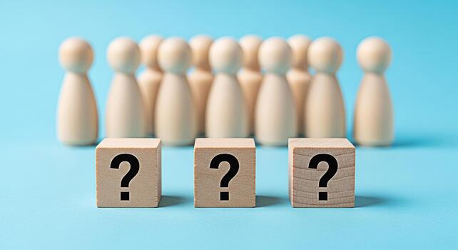 Wooden figures standing behind question mark blocks on a blue surface representing uncertainty and the need for answers in business social issues or personal dilemmas creating a sense of mystery photo