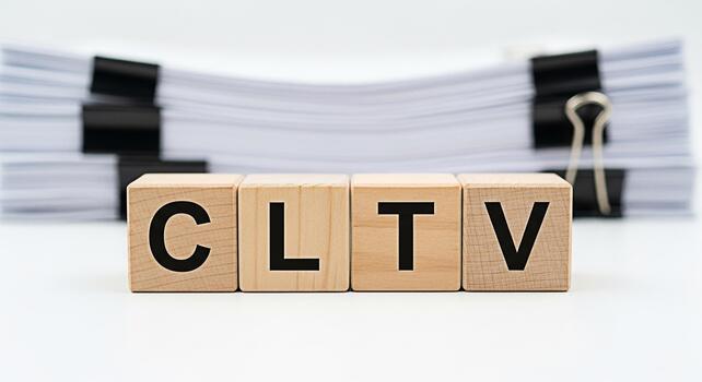 Wooden blocks spelling CLTV in a bright studio setting representing Customer Lifetime Value a key metric for business success and customer relationship management emphasizing growth and profitability photo