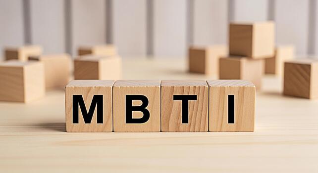 Wooden blocks spelling out MBTI on a light wooden surface symbolizing personality assessment and psychological types in a bright neutral setting representing selfdiscovery and understanding photo