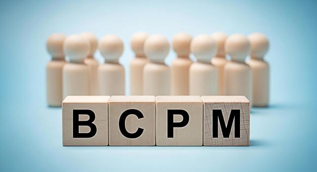 Wooden figures standing behind BCPM blocks on a blue surface representing Business Continuity Planning and Management highlighting teamwork strategy and organizational resilience in a corporate enviro photo