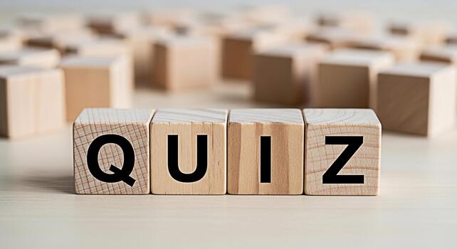 Wooden blocks spelling QUIZ on a table inviting participation and testing knowledge in an educational setting creating an atmosphere of intellectual challenge and fun photo
