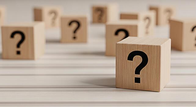 Wooden blocks displaying question marks on a striped surface representing uncertainty curiosity and the search for answers in a minimalist and thoughtprovoking setting ideal for educational or busines photo