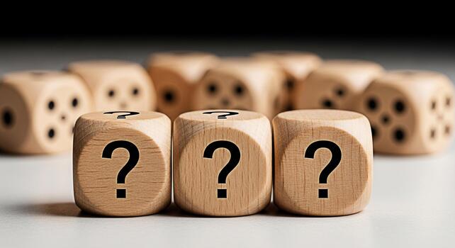 Wooden dice displaying question marks on a white surface representing uncertainty and decisionmaking in a studio setting creating a mood of contemplation and problemsolving photo
