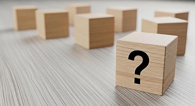 Wooden cube displaying a question mark on a light wooden surface representing uncertainty and the need for solutions in a clean and minimalist environment fostering a sense of curiosity and inquiry photo