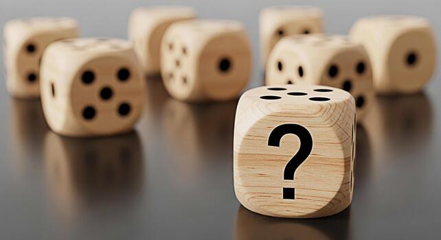 Wooden dice displaying a question mark on a reflective surface representing uncertainty and risk in decisionmaking creating a sense of mystery and intrigue about the unknown outcome of a gamble or cho photo