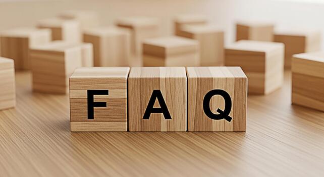 Wooden blocks spelling FAQ on a wooden surface representing frequently asked questions and information creating a sense of clarity and guidance for users seeking answers and support photo
