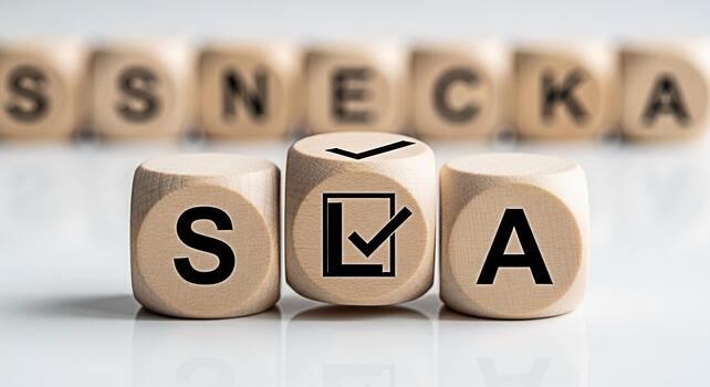 Wooden blocks spelling SLA with a checkmark representing Service Level Agreement in a bright minimalist setting conveying precision and commitment to quality assurance and customer satisfaction photo