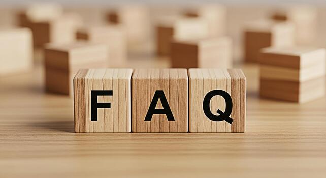 Wooden blocks displaying FAQ on a wooden surface representing frequently asked questions in a simple and clear manner conveying a sense of support and information access photo