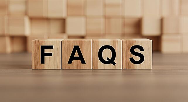 Wooden blocks spelling FAQs sitting on a table representing frequently asked questions in a business setting conveying clarity and support for customers seeking information and solutions photo