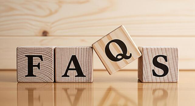 Wooden blocks spelling out FAQs on a wooden surface representing frequently asked questions and providing helpful information creating a sense of clarity and support for customers and users photo