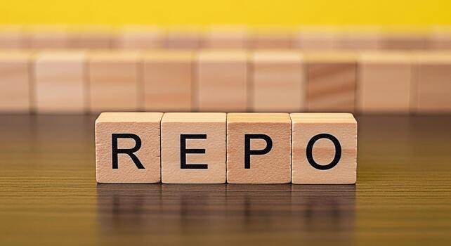 Wooden blocks spelling REPO on a wooden surface against a yellow background representing repurchase agreements and financial transactions in a clear and concise manner photo
