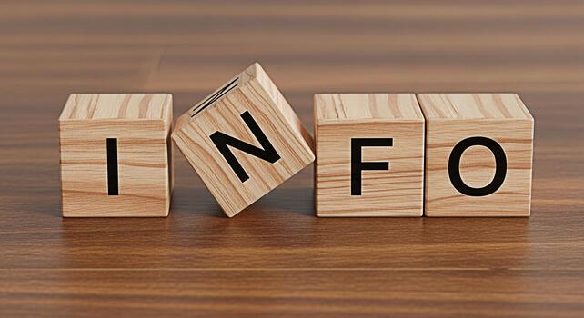 Wooden blocks spelling INFO on a wooden surface conveying the concept of information and knowledge in a simple and clear setting ideal for educational or businessrelated content photo